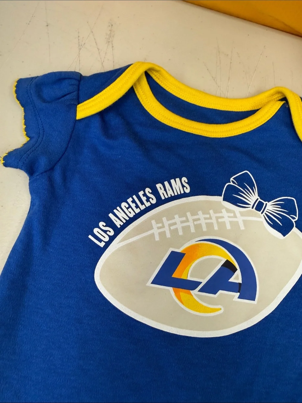 Los Angeles Rams Infant One-Piece Bodysuit in Royal Blue and Yellow 6-9 months